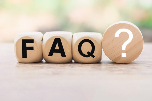 FAQ spelled using wooden letter cubes depicting heating oil consumption questions