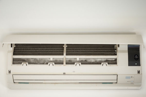 ice buildup on the air conditioner ductless indoor unit depicting frozen air conditioner coils