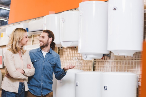 couple shopping for a new water heater depicting replacement