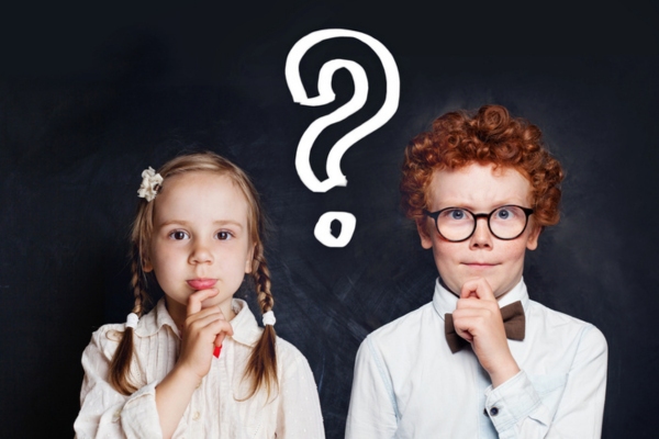 little girl and boy with question mark doodle in between depicting FAQs