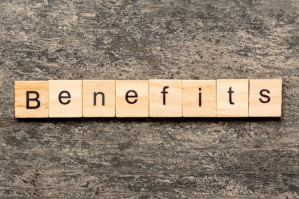 Benefits spelled using wooden letter chips depicting forced air heating