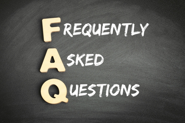 Frequently Asked Questions written on a chalkboard depicting FAQs about heating system repairs