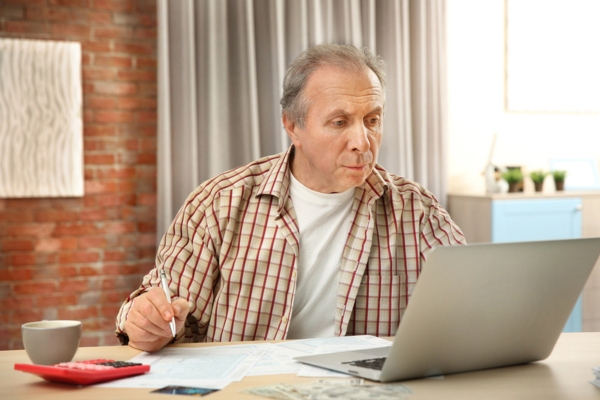 man evaluating home's fuel oil usage