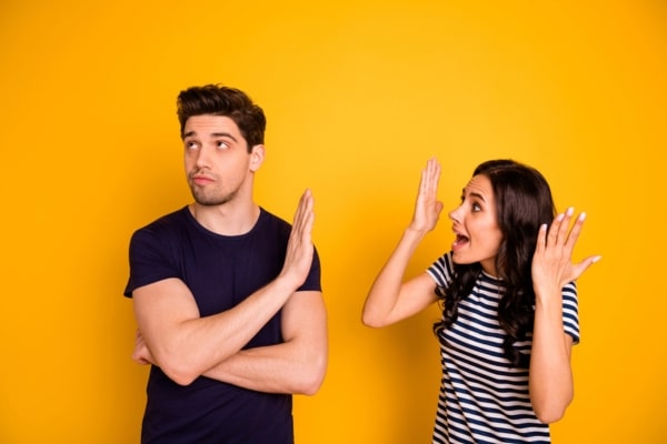 man ignoring woman depicting ignoring AC maintenance