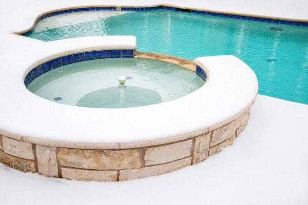 pool in winter depicting propane pool heating system